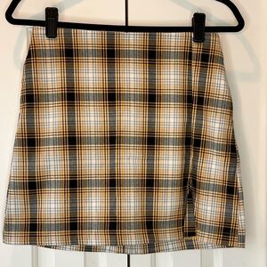 Urban Outfitters black, yellow & white plaid mini skirt.